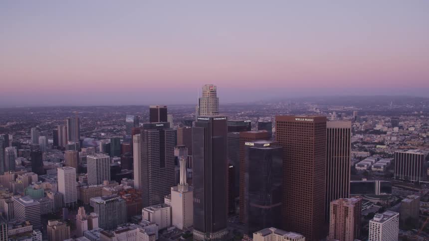 Aerial view high rise buildings and office buildings at dusk