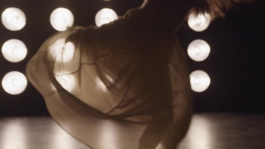 A woman dancing on stage