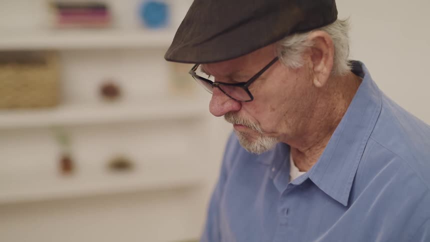 An elderly man inside