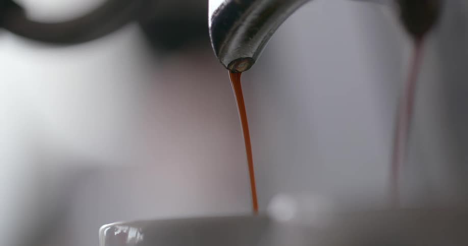 Liquid pouring out of a faucet