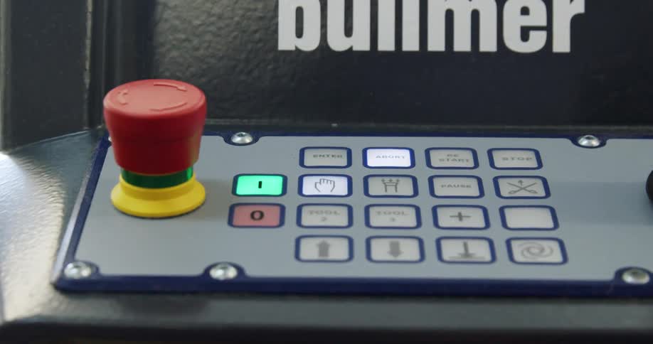A machine with lights buttons and controls