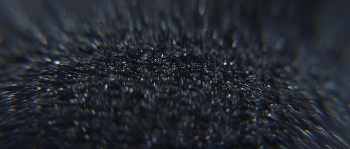 Magnetic sand forms small peaks that move left and right