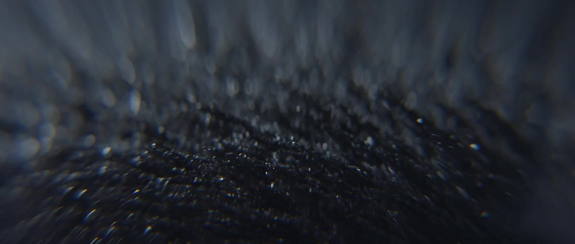 Magnetic sand moves in small peaks from right to left
