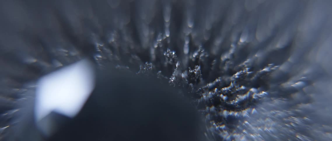 Movement of magnetic metal shavings