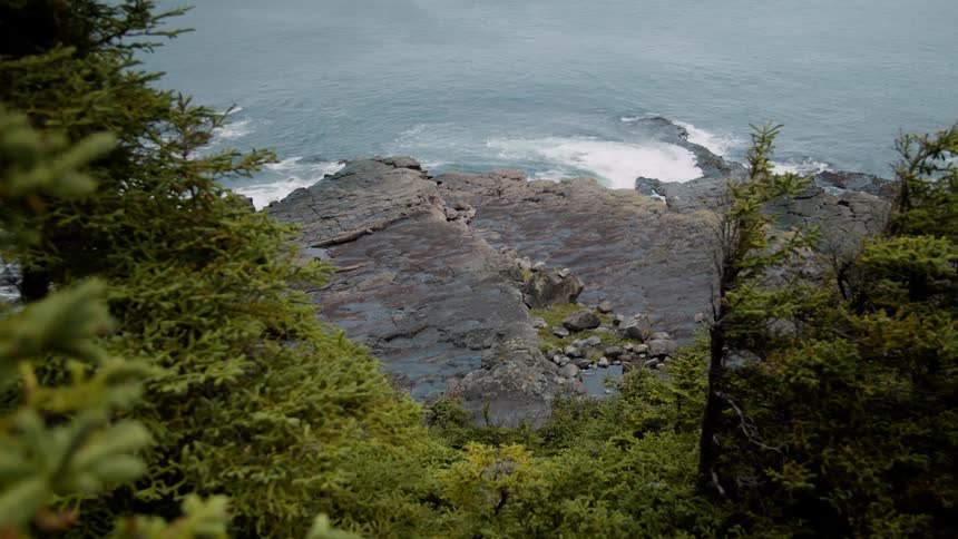 Water rolling over the stone on the coast