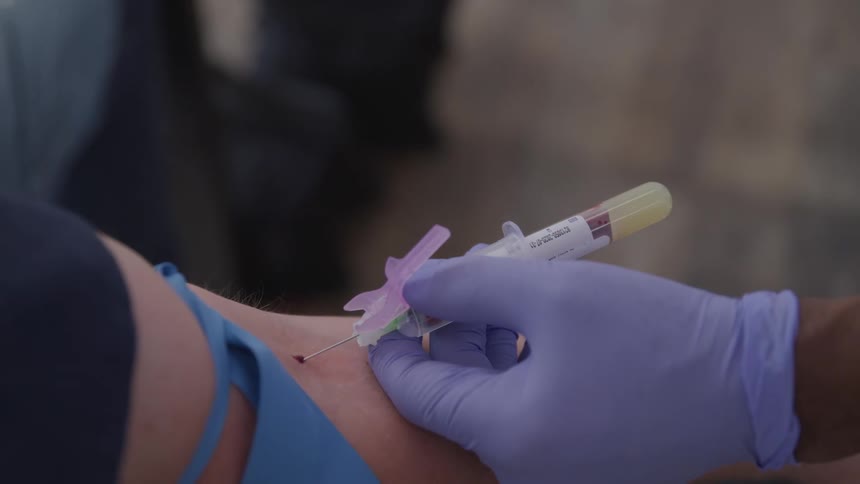 A person is having blood drawn