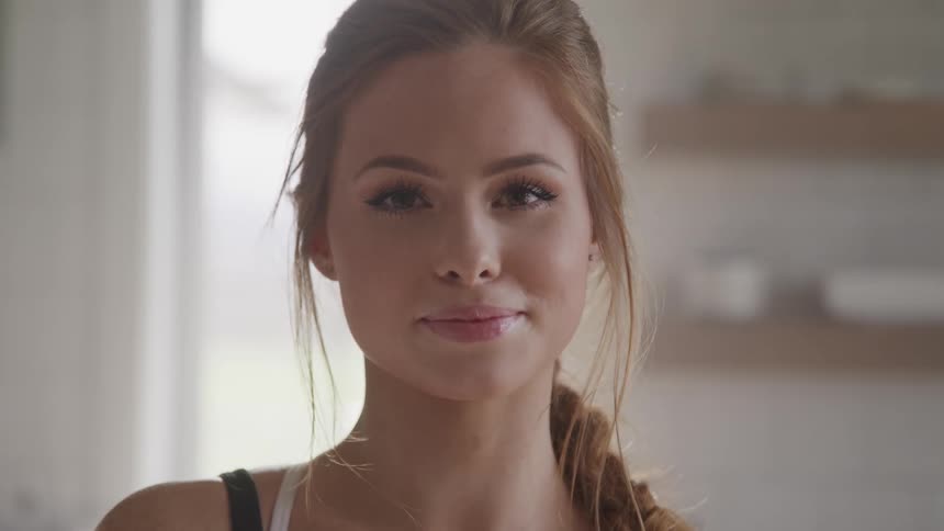 A teenage girl in her home