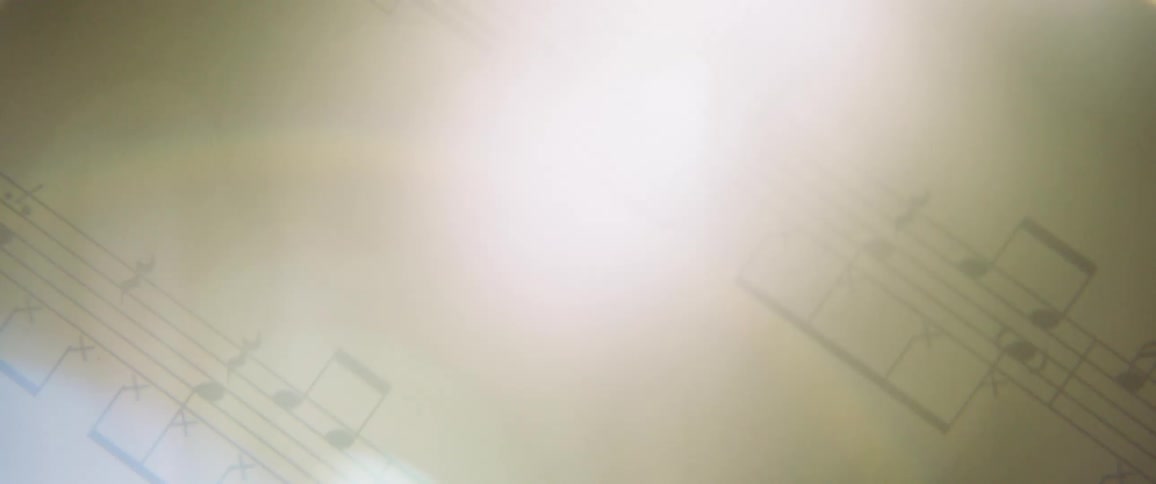 A bright light is illuminating a music score