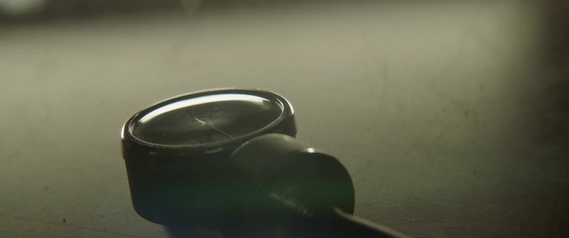 A gauge sits on a counter