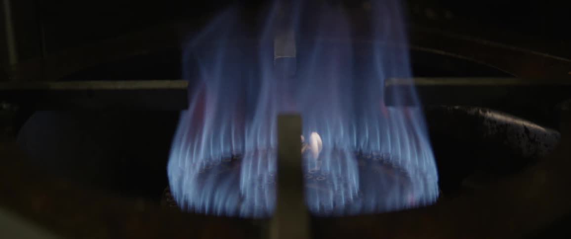 Flames on a stove burning