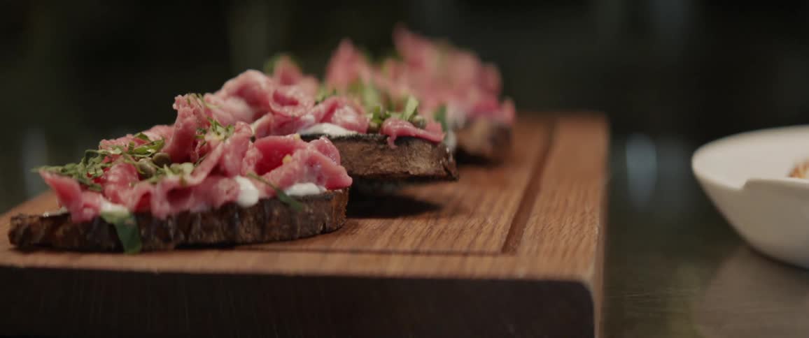 Food is served on a wood platter