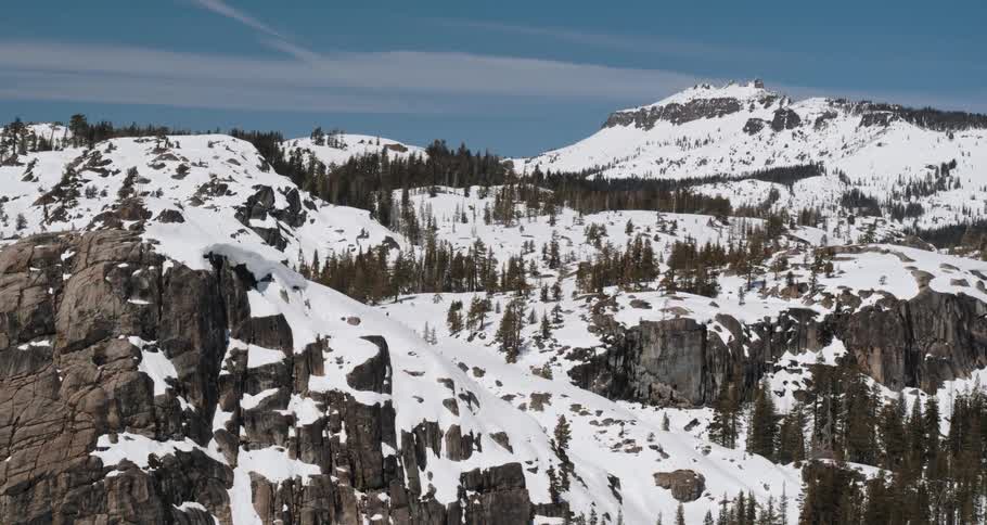 Aerial view of snow covered mountains