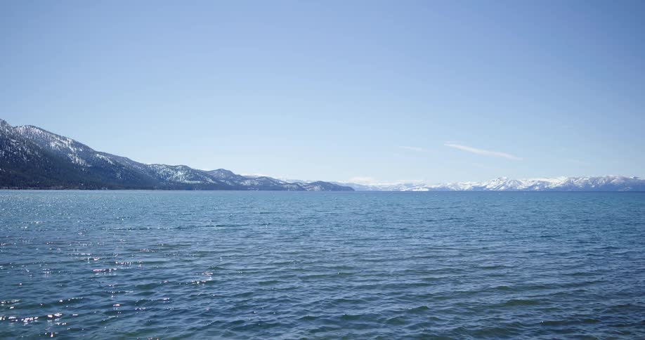 Landscape view of the ocean with hills in the distance
