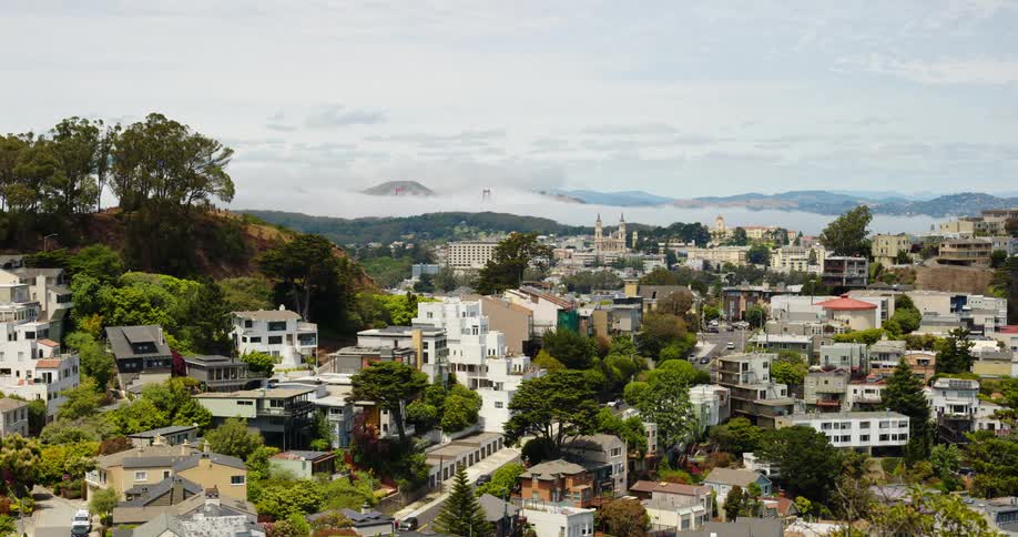 A view of a neighborhood with houses is displayed