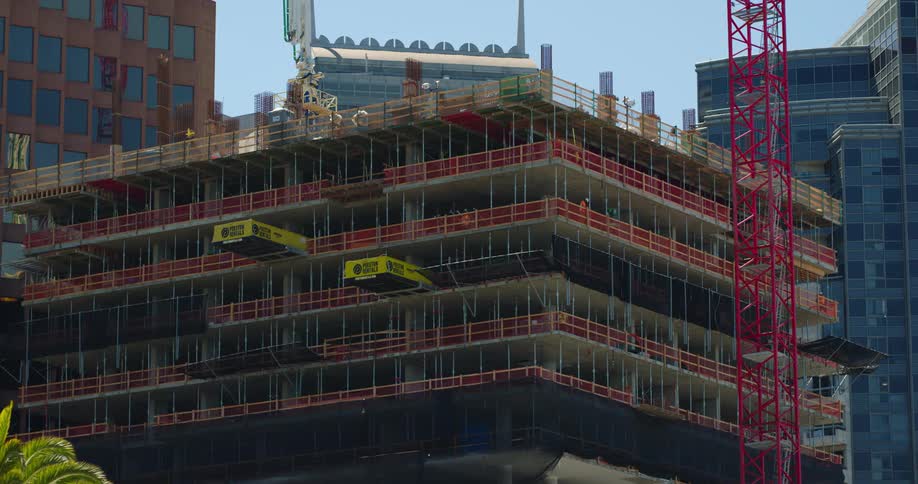 Employees on a building at a construction site