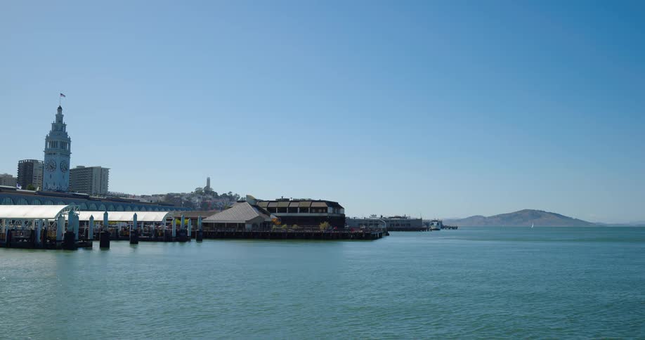 The water is calm near the port