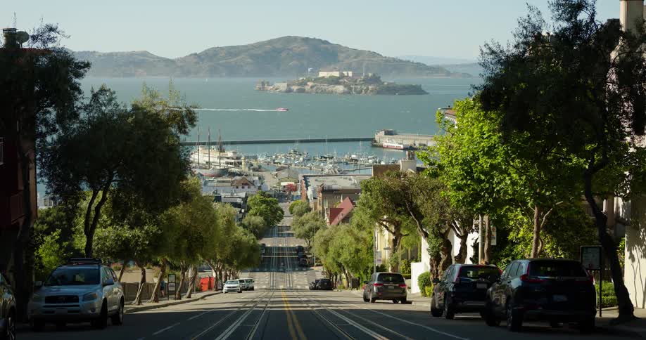 Alcatraz island in the san francisco bay area shot from the street of the city at day