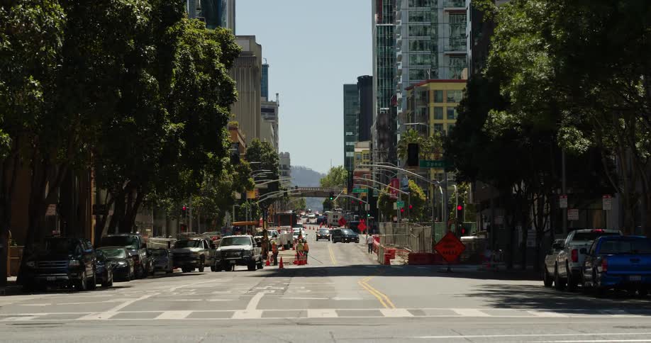 Cars travel on the street in the distance