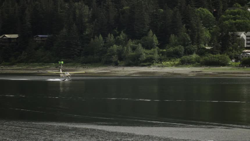 A seaplane lands on water