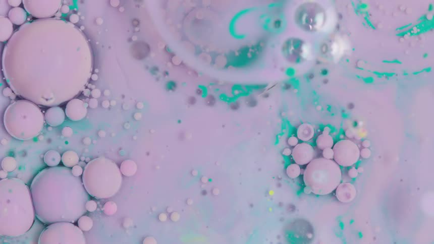 Flowing pink and green paints