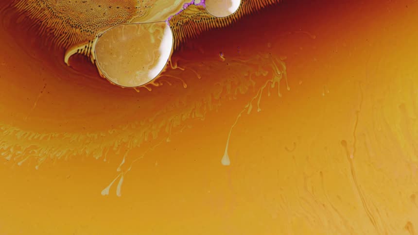 Flowing orange and yellow liquid