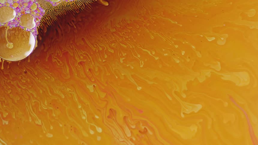Movement of yellow and orange liquid