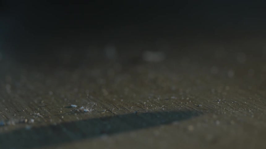 Vacuum wand sucks up the dust from the floor