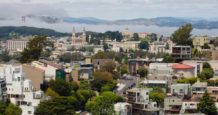 An aerial view of a city is displayed in spring