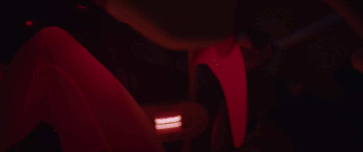 The lights flash in this room as a man exercises