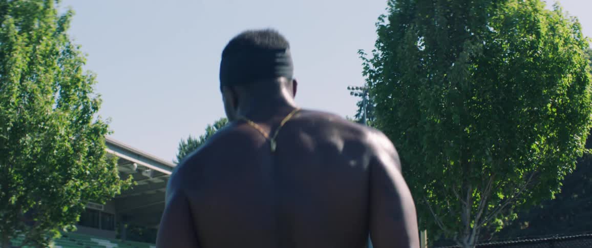 A man walking around on a football field