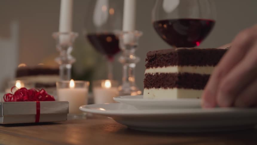 A piece of cake is served on the table