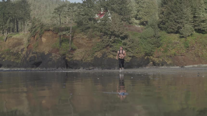 A man running to a water area