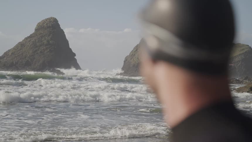 The waves slowly crash on the shore