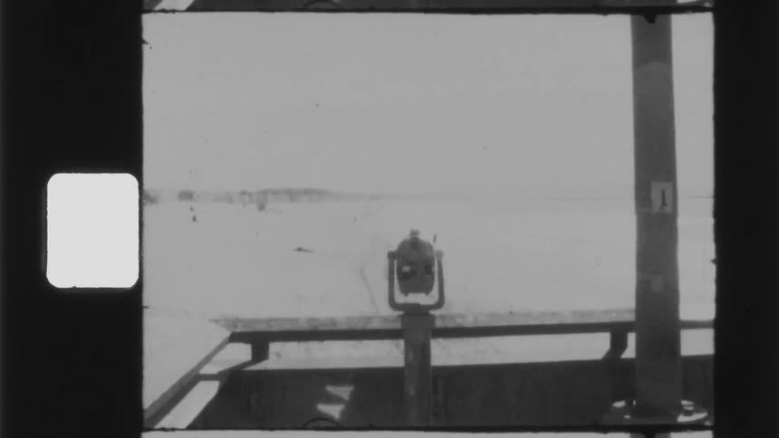 Vintage footage of a telescope on a balcony