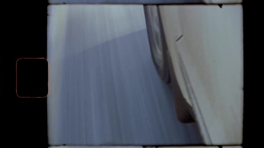 Footage of a car driving is displayed
