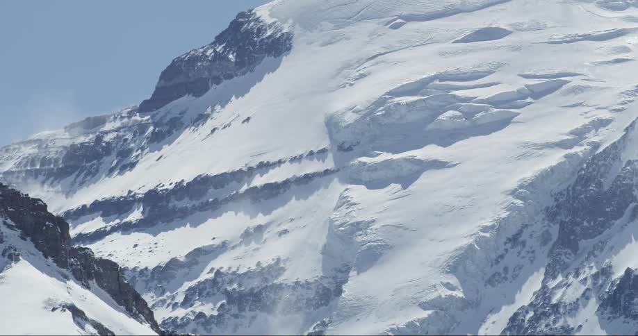 A mountain covered in glacier