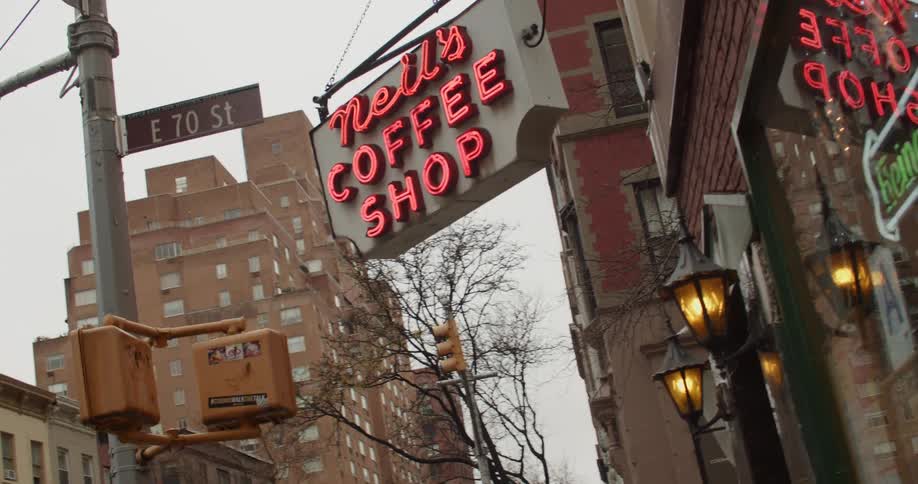 A coffee shop on a city street on a winter day