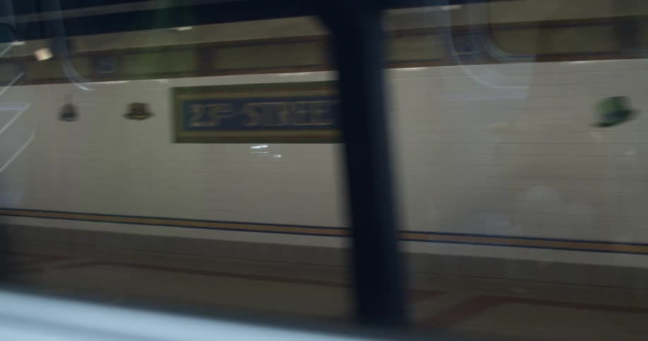 Public transport passes through transit station and waiting passengers