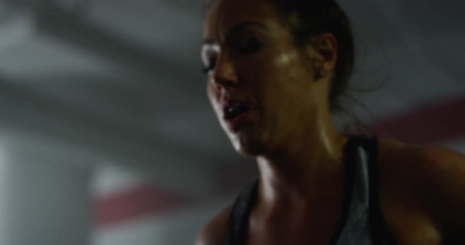 A woman is exercising indoors