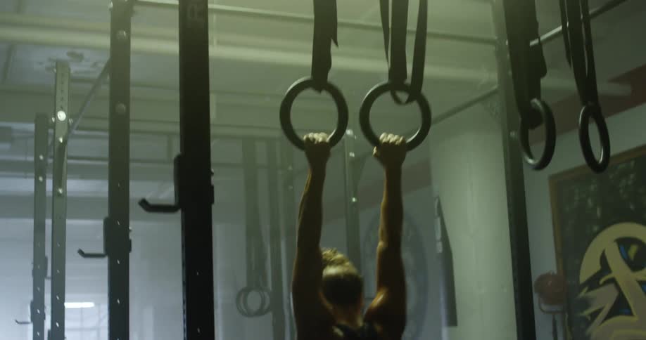 A woman is working out in a gym