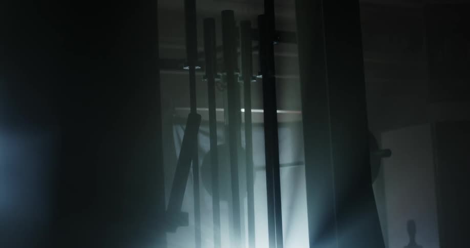 Weight lifting equipment inside a garage