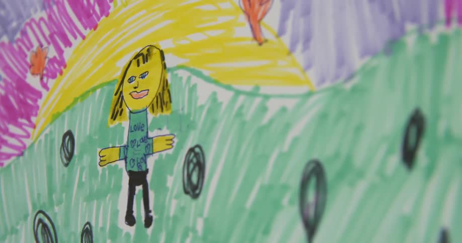 A marker drawing of a person standing outdoors by a child