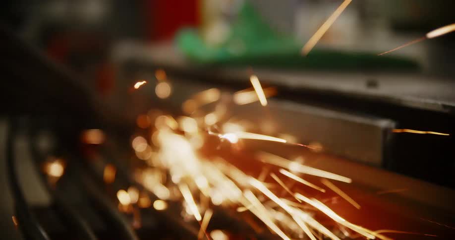 Sparks fly as a person welds