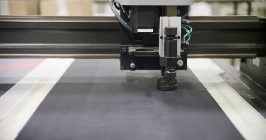 A machine with wires and screws moving