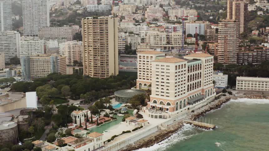 An aerial view of a downtown city is displayed