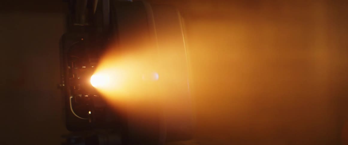 Light shining from a movie projector in the dark