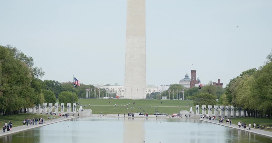 People travel near the washington monument