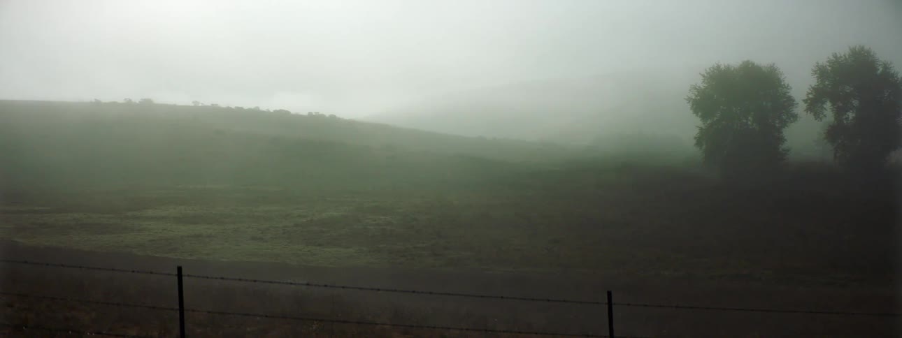 Heavy fog is covering the hills