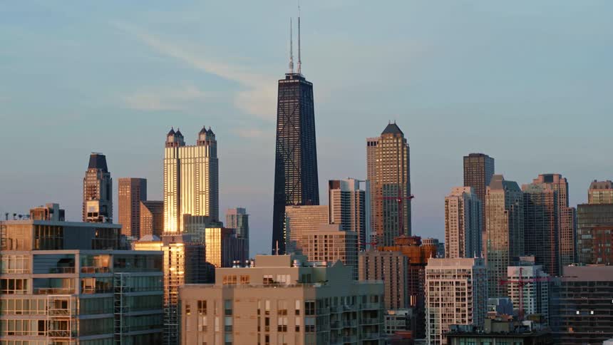A view of apartment buildings with downtown Chicago in background