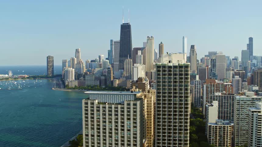 An aerial view of a downtown city is displayed
